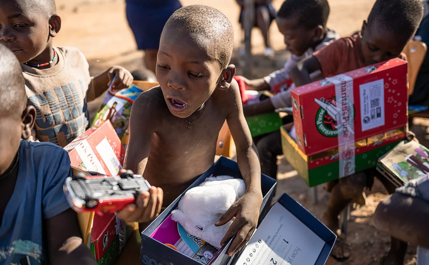 Himba child receives shoebox gift