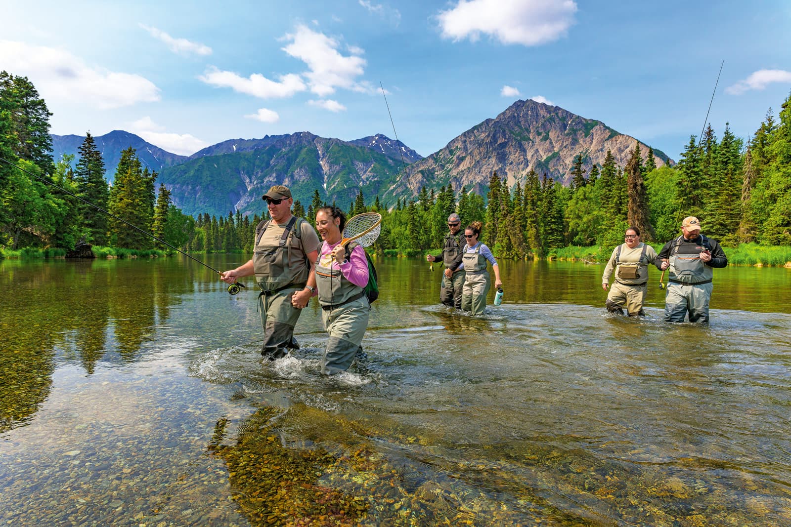 Veterans and spouses enjoy fly fishing in the Kijik River.