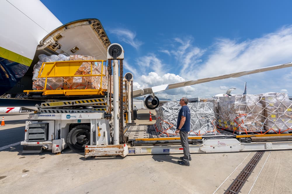 Samaritan’s Purse aircraft being unloaded with large pallets of supplies for Jamaica.