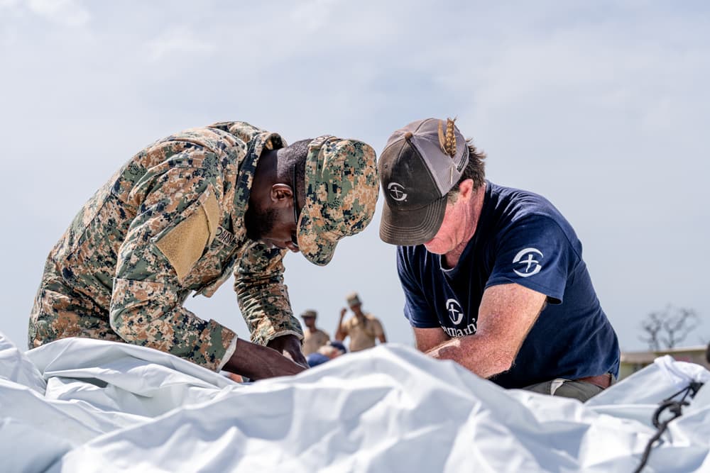 Samaritan’s Purse and Jamaican Defense Force member assemble the Emergency Field Hospital after Hurricane Melissa in Black River, Jamaica.