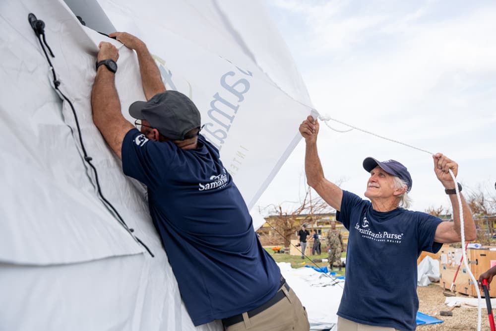 Samaritan’s Purse workers assembling medical tents for the Emergency Field Hospital in Jamaica after Hurricane Melissa.