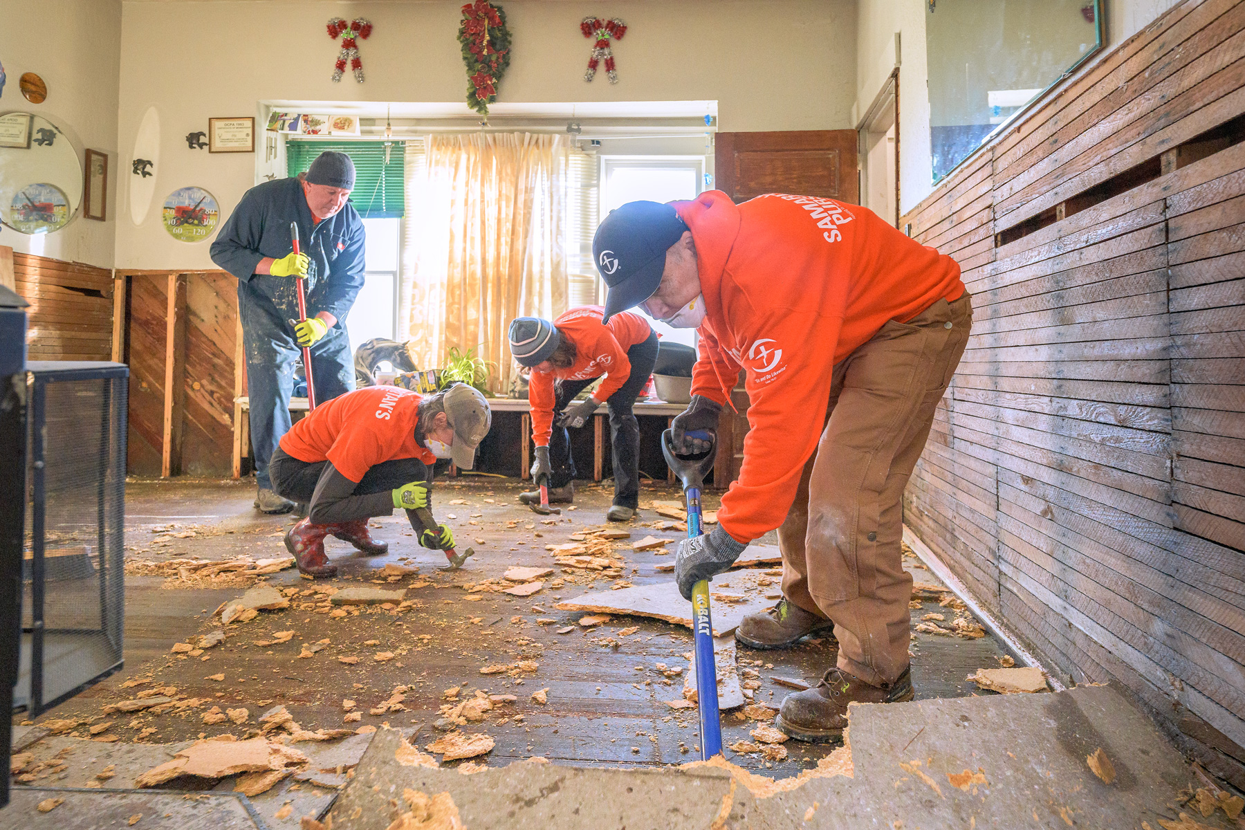 Samaritan's Purse volunteers helping to clean up after the flood