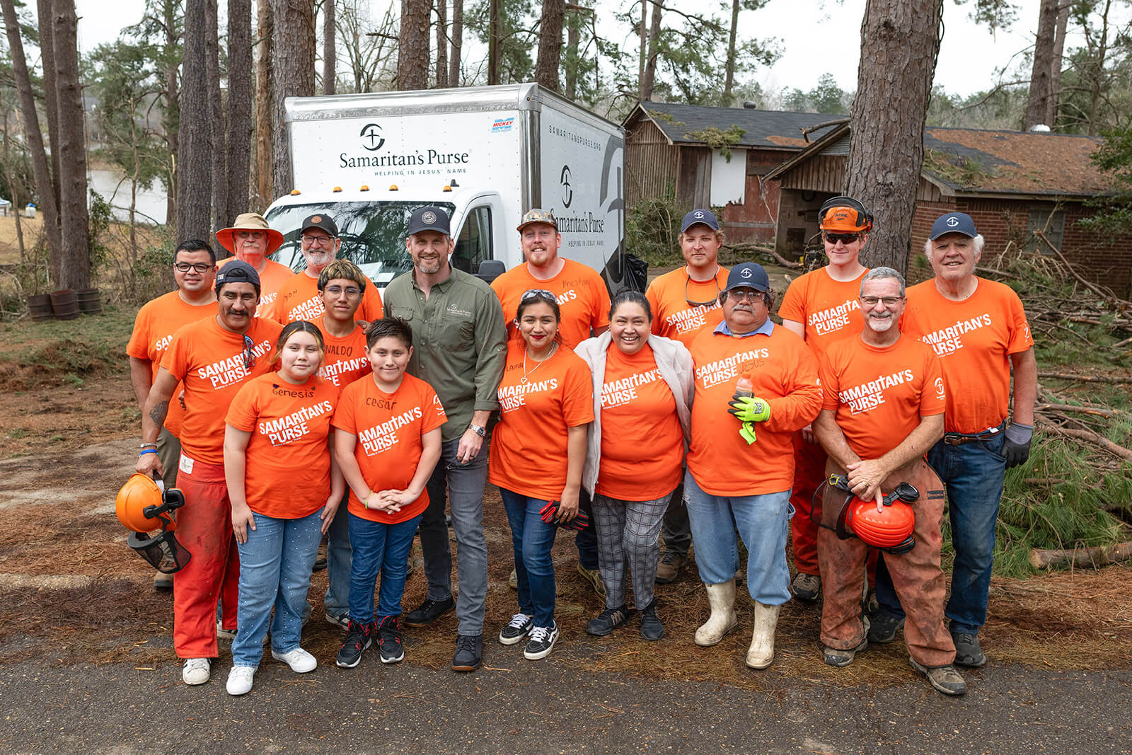 Edward Graham visits with homeowners and volunteers in West Monroe, Louisiana