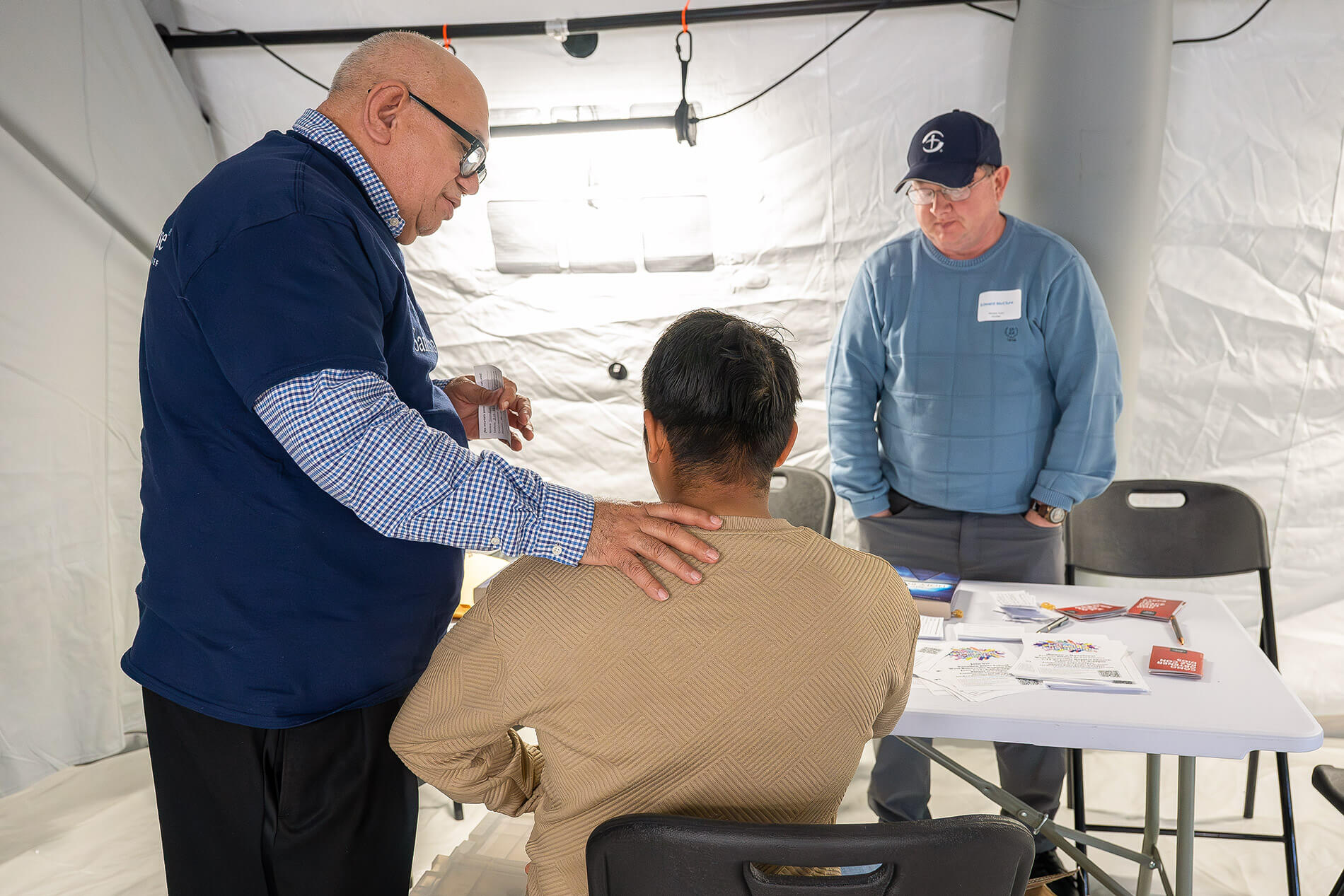 Samaritan's Purse volunteers assisting a man in Burnsville, NC