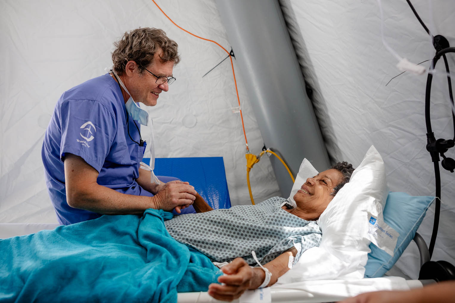 Dr. Cooper met with a surgical patient at our field hospital where our team has completed more than 200 surgical procedures since the June 24 earthquake that destroyed large portions of La Guaira.