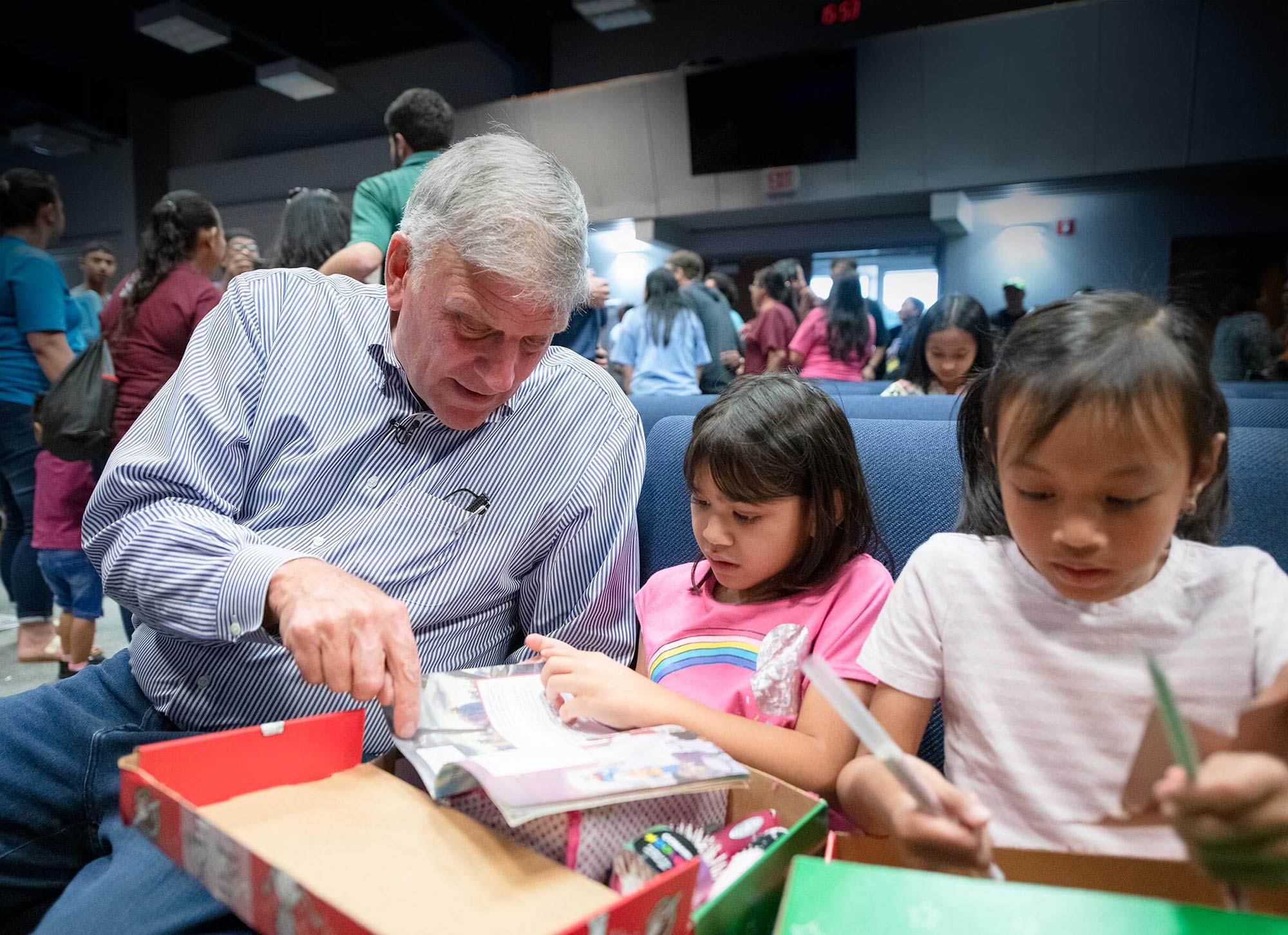 Samaritan's Purse President Franklin Graham with children from Guam